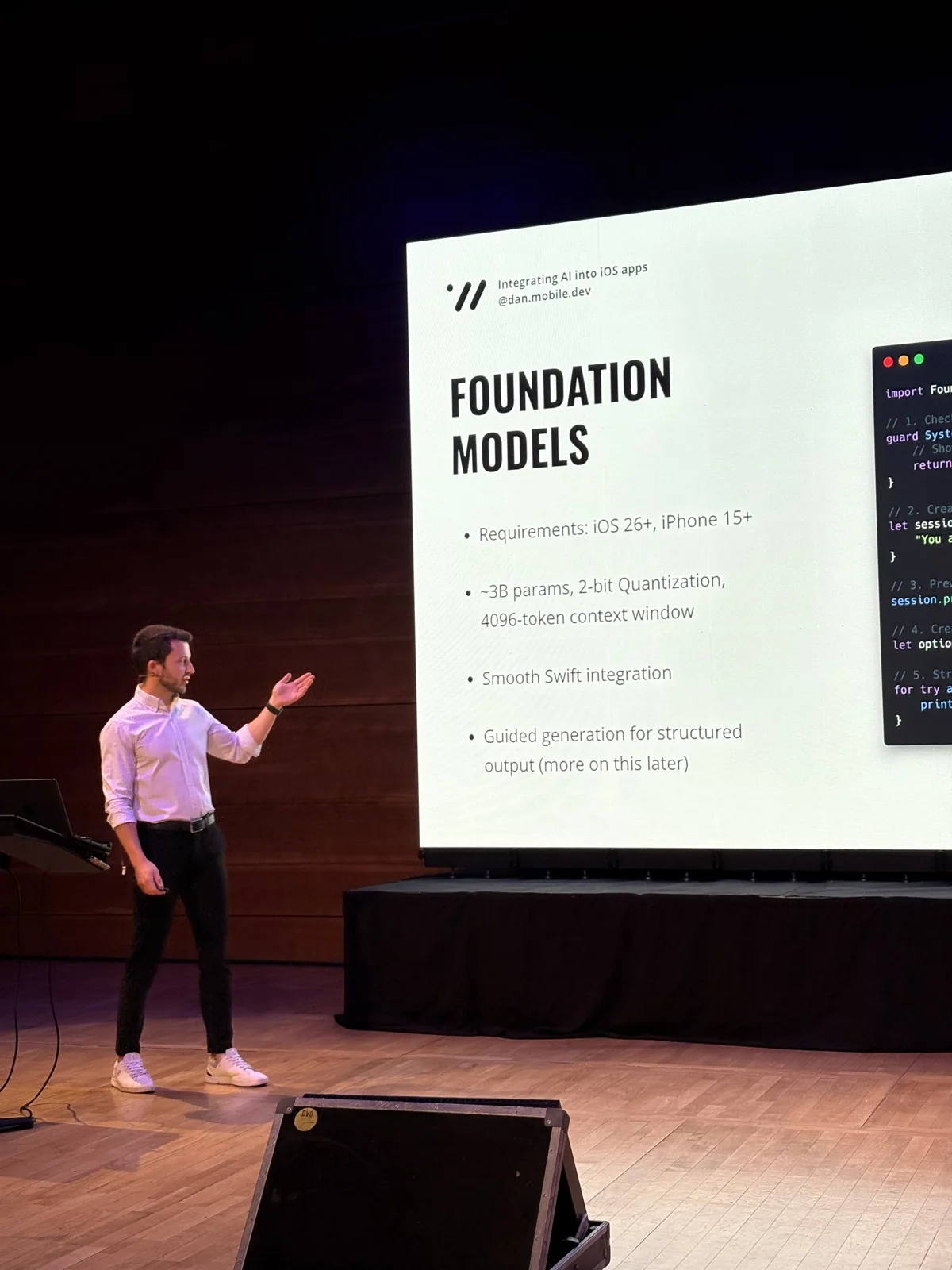Dan presenting a Foundation Models slide at iOSKonf 2026