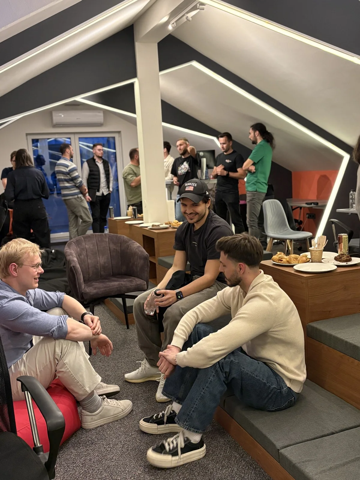 Attendees talking at the 2026 mobile developer meetup in Cluj-Napoca